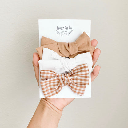 Hand Tied White Eyelet Bow